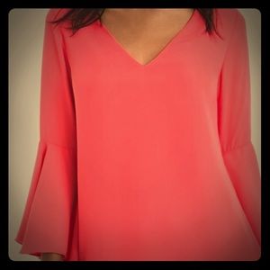 Peachy pink top with bell sleeves